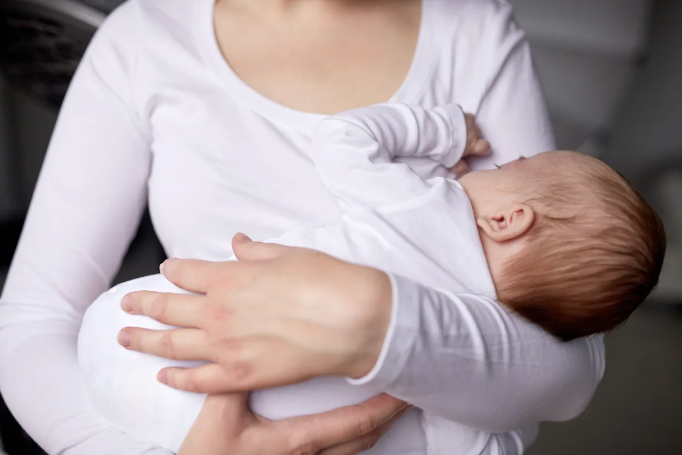 Baby being breast fed